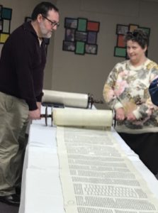 Unrolling a Torah scroll