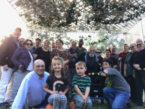 Sukkot celebration - We all fit under the sukkah