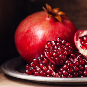 Vibrant red pomegranate with seeds