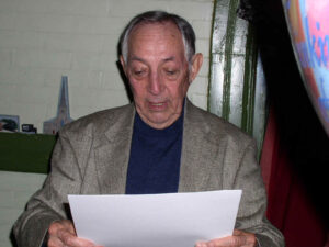 Bert Butler reading a script
