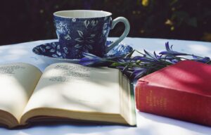 Ope book and coffee mug